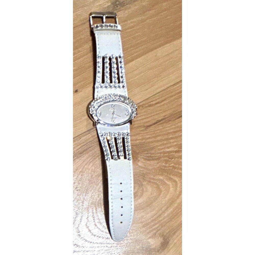 GENEVA PLATINUM WOMEN'S QUARTZ OVAL ANALOG WHITE FAUX STRAP SILVER RHINESTONE